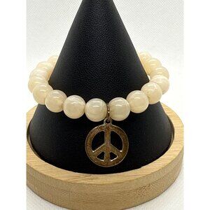 Beaded Stretch Bracelet With Gold Peace Charm